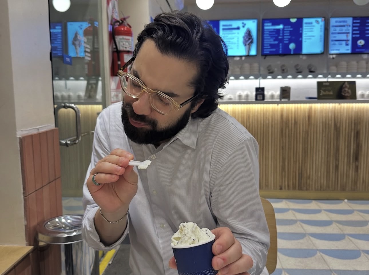 Alex enjoying ice cream in a Buenos Aires shop