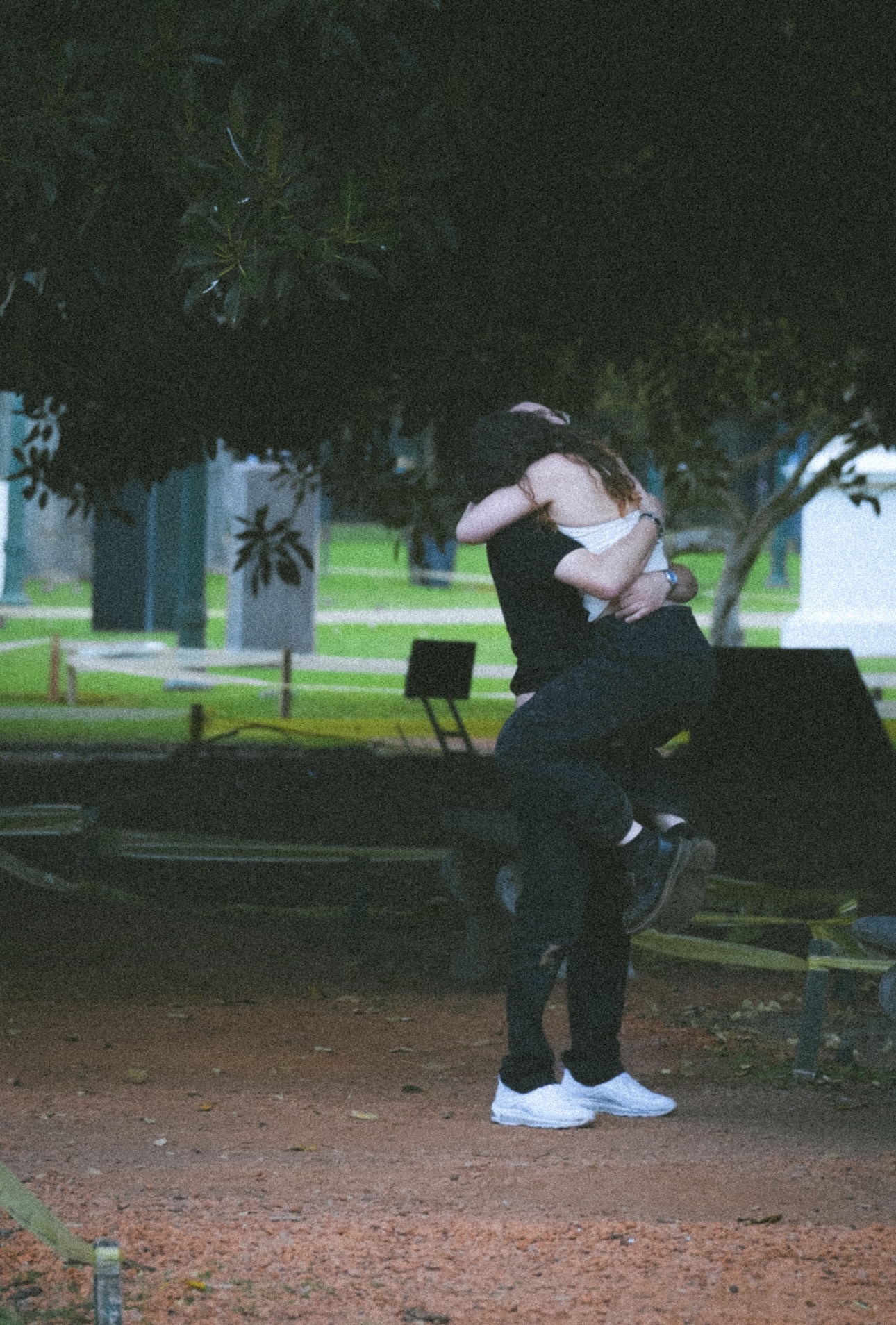 Mica jumping into Alex’s arms after the proposal