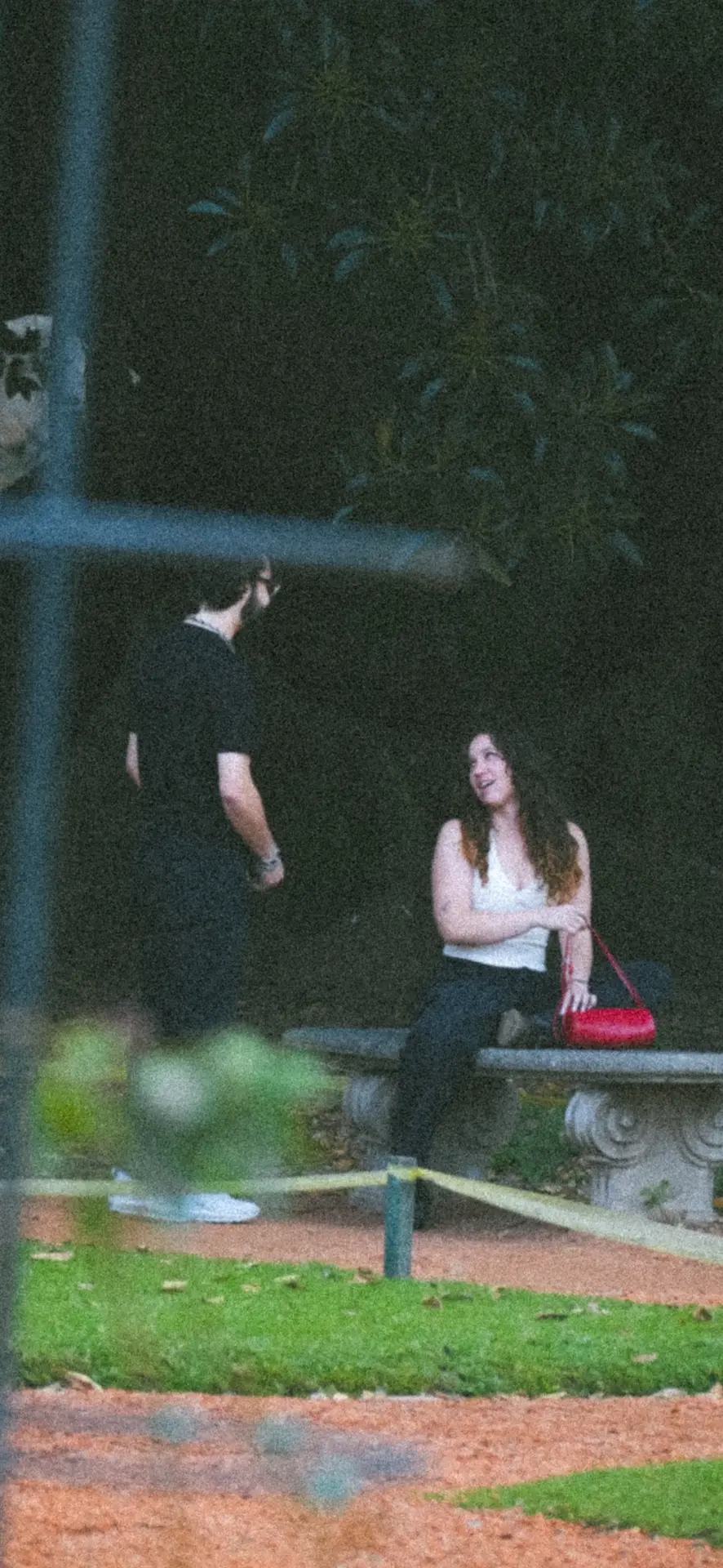 Mica smiling with Alex in the garden